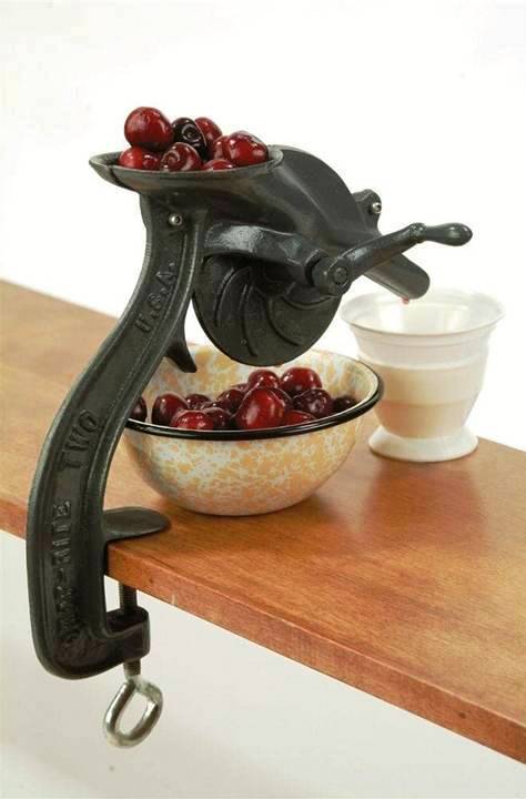 ANTIQUE CHERRY PITTER