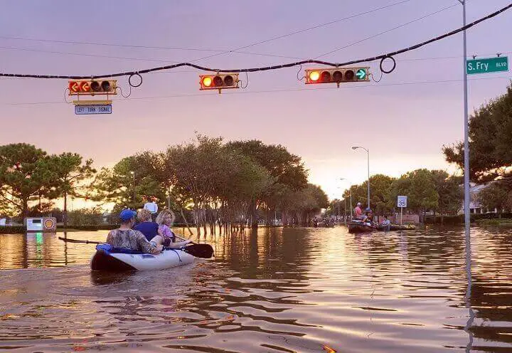 Family in Inflatable Raft During Flood