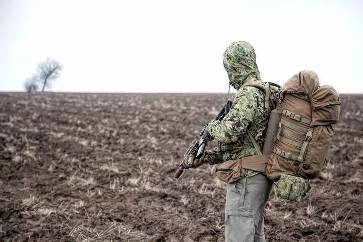 Soldier With a Military Tactical Backpack